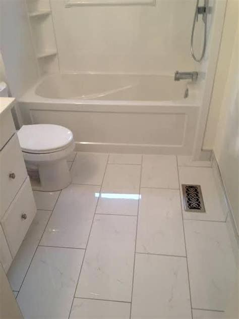 A small bathroom can actually benefit from a large tile. 12x24 bathroom tile layout tiles tile in a small bathroom ...