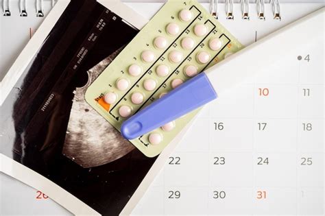Premium Photo Pregnancy Test And Birth Control Pills With Ultrasound