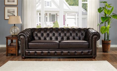 For combining an accent color with brown leather furniture you'll most often want to use a cool accent background to balance the warmth of brown. Albany Brown Leather Sofa from Amax Leather | Coleman Furniture