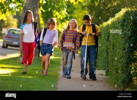 Children Walking Home From School Stock Photo Alamy