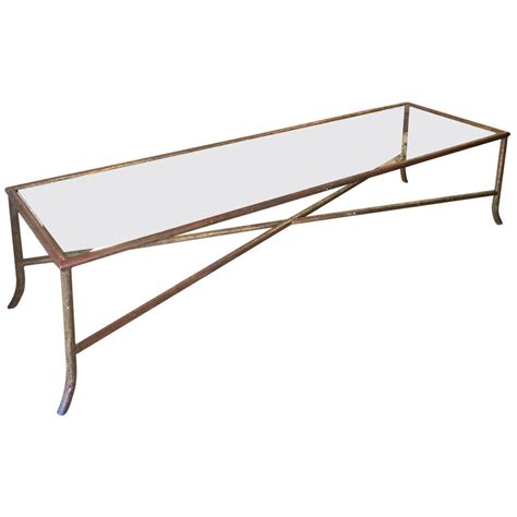 By the way, open shelving will let the light in and divide the room into sections. Long Narrow Bagues Style Faux Bois Coffee Table at 1stdibs