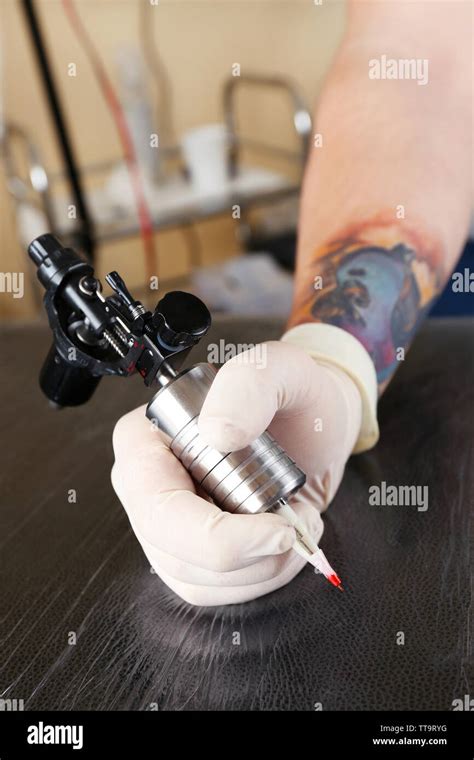 Tattoo Artist At Work Close Up Stock Photo Alamy