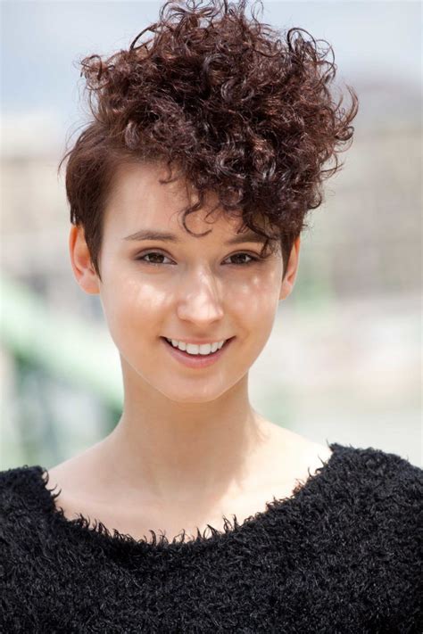 A pixie haircut looks great with curly hair. curly side shave curly hairstyles for round faces | Curly ...