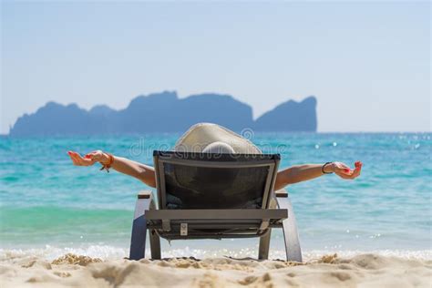 Cute Woman Relaxing On A Sunbed And Look To The Sea Shore Stock Image Image Of Resort Ocean