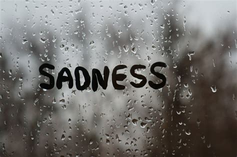 Download Sad Aesthetic Word At Rained Window Wallpaper