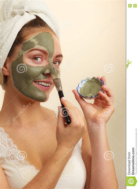 Woman Applying With Brush Clay Mud Mask To Her Face Stock Image Image Of Algae Green
