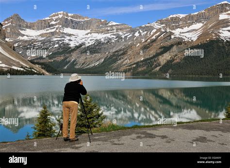 Photographer At Bow Lake Banff National Park Alberta Canada Stock