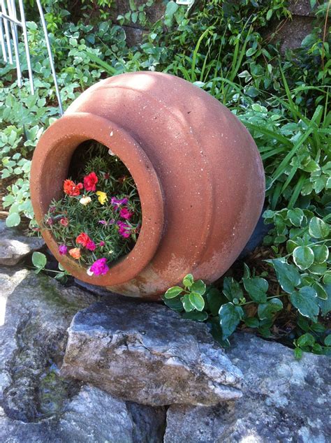 one of our clients loves to use her planting pots in unique ways check out this pot placed on