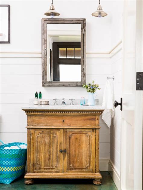 Rustic bathroom with a wood pedestal sink #18. Photo Page | HGTV