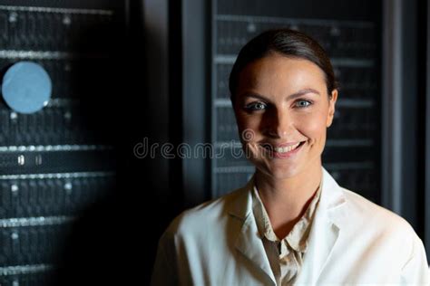Portrait Of Caucasian Female Engineer Wearing An Apron Smiling In