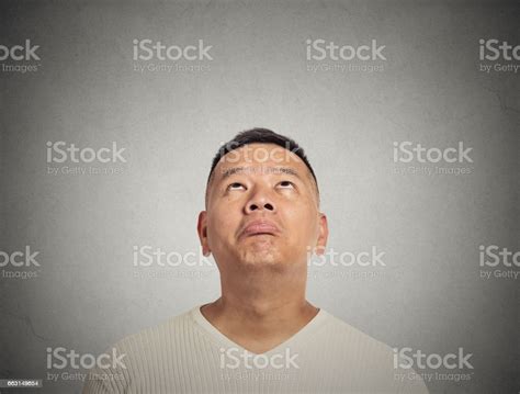 Portrait Disappointed Young Man Looking Up Stock Photo Download Image