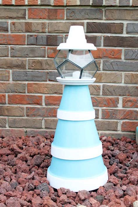 Each one, or even a combination, makes a stunning garden but will have different maintenance requirements. Flower Pot Lighthouse: Make Your Own! - The Country Chic ...