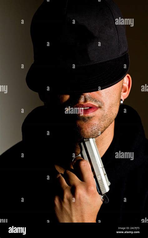 Holding Gun To Head Hi Res Stock Photography And Images Alamy