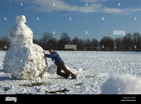 Building A Big Snowman And Winter Snow Scenes In Londons Regents Park