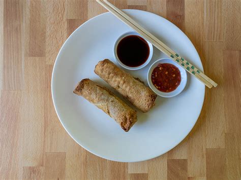 Cooking frozen egg rolls in the air fryer is so easy! How to cook Whole Foods Vegetable Egg Rolls in an air ...