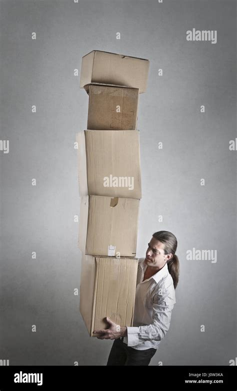 Carrying Heavy Boxes Hi Res Stock Photography And Images Alamy