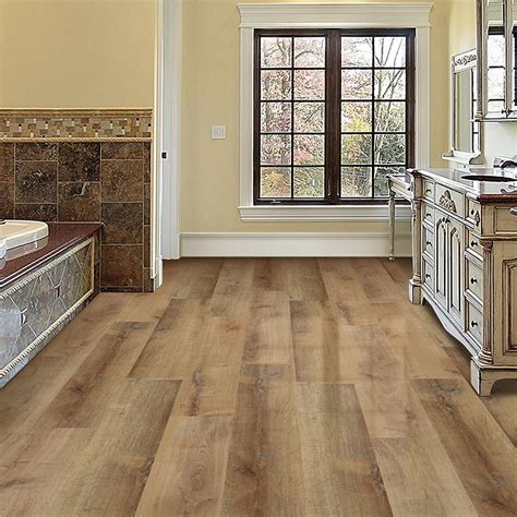 Trafficmaster laminate flooring is a budget flooring made by shaw industries for distribution exclusively through the home depot. TrafficMASTER Allure Ultra Wide 8.7 in. x 47.6 in. Golden ...