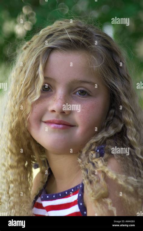 Young Girl With Curly Hair Stock Photo Alamy