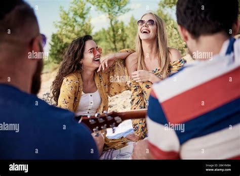 Group Of Young People Having Fun On The Beach Hi Res Stock Photography