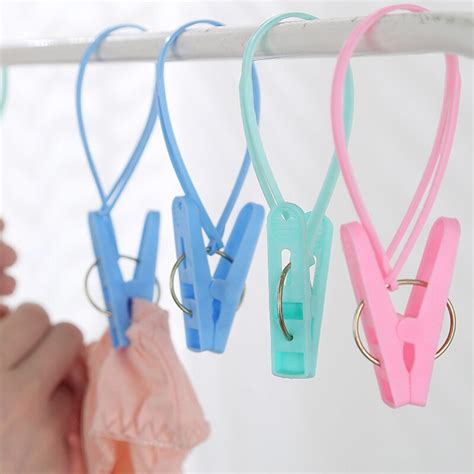 New 12pcslot Plastic Clothes Pegs Portable Home Travel Hangers Rack