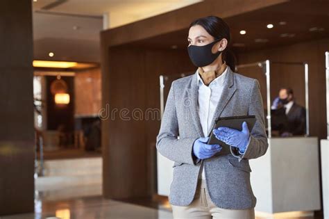 Female Receptionist Welcoming People In The Hotel Stock Photo Image