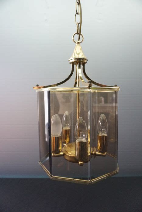 A glass ceiling is a metaphor used to represent an invisible barrier that keeps a given demographic (typically applied to minorities) from rising beyond a certain level in a hierarchy.1. Ceiling lamp, smoke glass with 5 light points - Regency ...