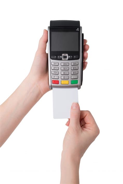 Learn what is credit card machine in malaysia. Premium Photo | Payment by credit card through the pos ...