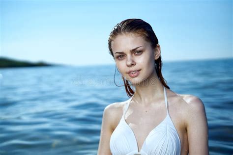 Beautiful Young Woman Is Resting On The Sea Ocean Beach Water Vacation Stock Image Image