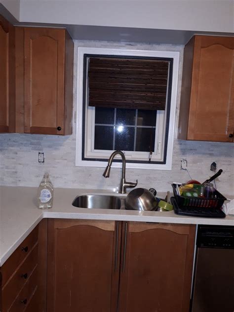 Small southwest galley brick floor and wood ceiling kitchen photo in phoenix with an undermount sink, shaker cabinets, dark wood cabinets, quartz countertops, multicolored backsplash, cement tile backsplash, stainless steel appliances, an island and beige countertops Pin on my next reno