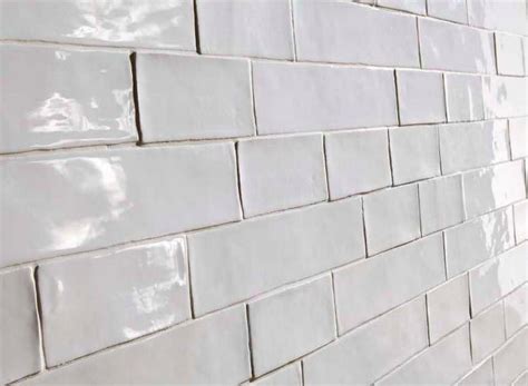 If you're following the traditional subway tile layout, this means that you'll start with a half tile from the outer edge. DARLINGTON: Kitchen Backsplash Inspiration