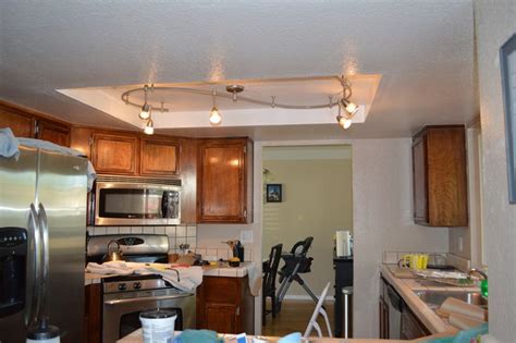 Decorative light panels are available to fit a variety of square and rectangular fluorescent light devices. remodel flourescent light box in kitchen - Bing images ...