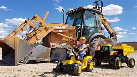 Kid Plays Tonka Dump Truck And Dirt Digger Tractor Power Wheels Youtube