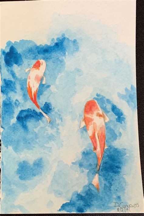 Two Orange And White Koi Fish Swimming In The Blue Water With Clouds