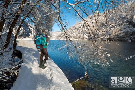 Woman Visiting Plitvice Lakes National Park In Winter Plitvicka Jezera
