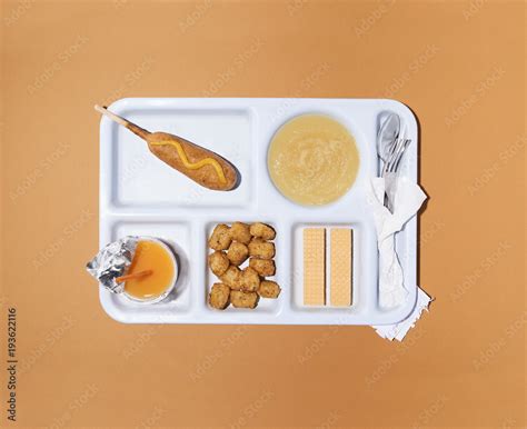 School Lunchcorn Dog Tater Tots Apple Sauce Wafers And Orange Drink