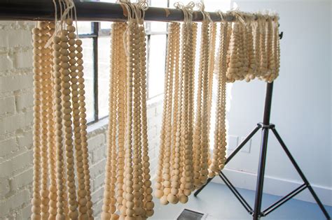 Diy beaded chandelier using gold beads. DIY Bead Chandelier - The House That Lars Built