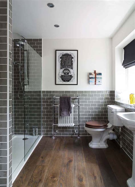 The brass mirror really stands out against the gray wallpaper while the two brown nickel and glass wall sconces tie it all together. 53 Most fabulous traditional style bathroom designs ever