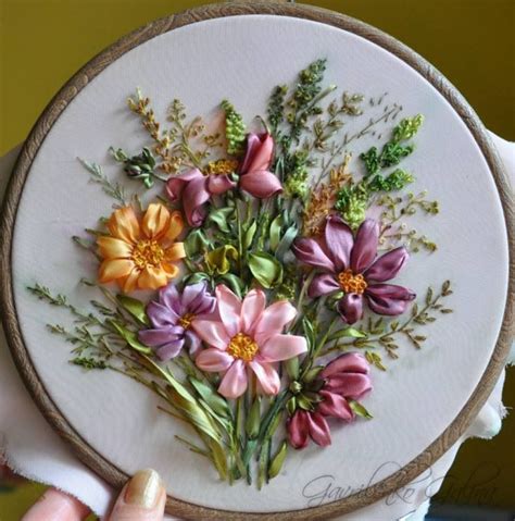 Using the same ribbon roses and ric rack flowers as the bouquets tied things together nicely. ribbon embroidery | Embroidery: Ribbon Embroidery | Pinterest