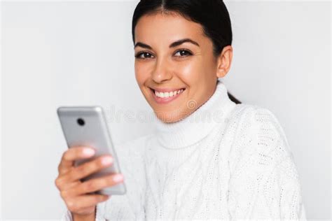 Portrait Of Attractive Young Happy Woman With Mobile Phone With Pretty Toothy Smile On The