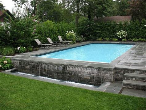 25 Best Rectangle Swimming Pools With Waterfall Design Ideas To Steal