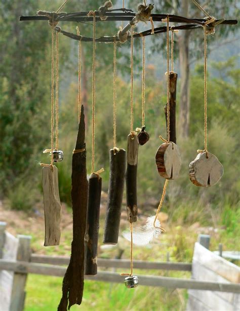A Wind Chime Hanging From The Side Of A Wooden Fence