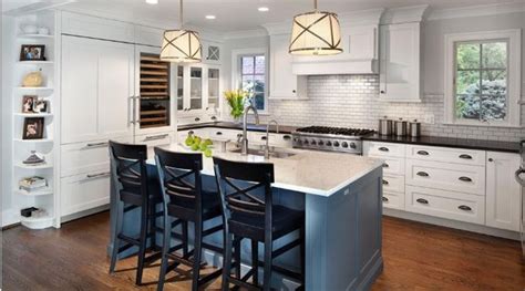I promised a tutorial on how i painted my kitchen island, and i'm finally making good on it. White Painted Kitchen with blue island - Traditional ...