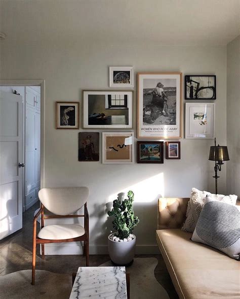 How High Should You Hang Pictures Above A Sofa Baci Living Room