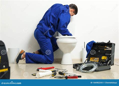 Professional Plumber Working With Toilet Bowl Stock Image Image Of