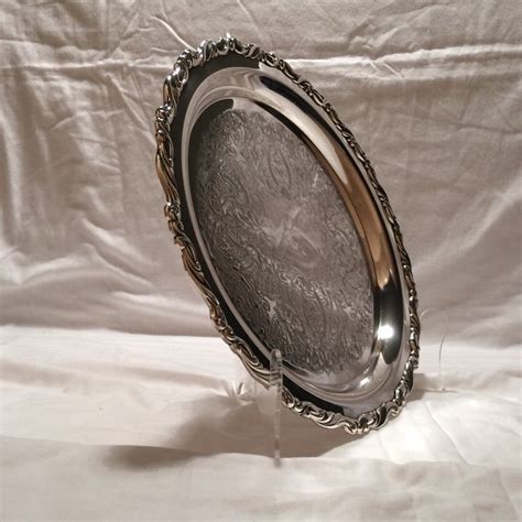 Get the amazon experience for your business. Vintage Oneida Silver Plated Round Serving Tray | Chairish