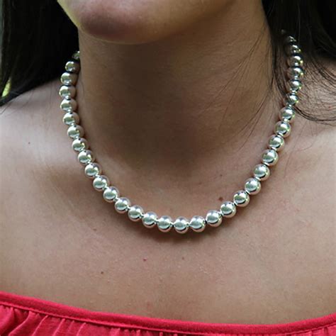 Complement Your Outfit With Silver Bead Necklace