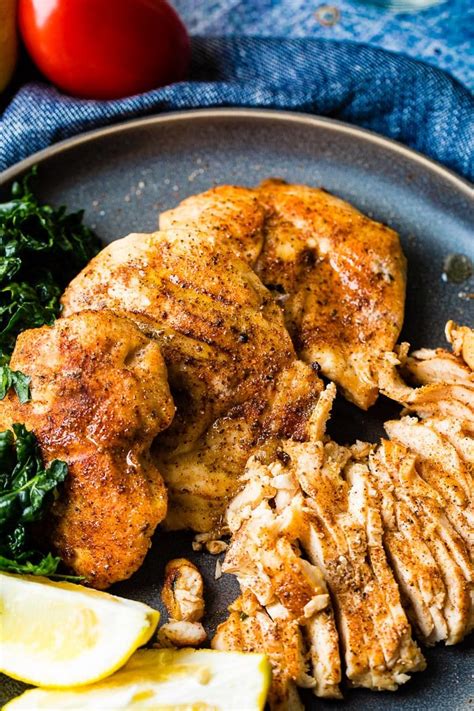 Recipes for grilling and smoking turkey, chicken, steak, bacon, brisket, salmon, vegetables and everything in between. Easy Smoked Chicken on a Traeger - Oh Sweet Basil
