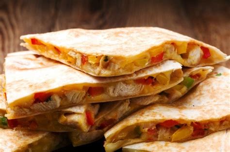 Brush one side of each tortilla with butter. Quesadilla Recipes | ThriftyFun