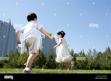 Children Playing In The Park Stock Photo Alamy