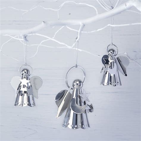 Silver Christmas Angel By The Christmas Home